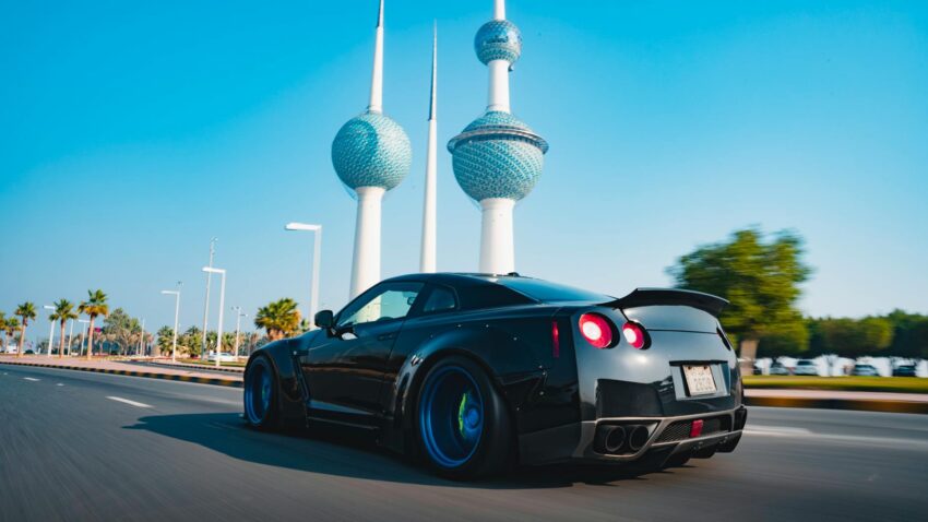 a black sports car on the road